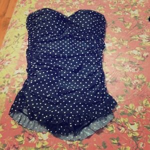 Polka dot bathing suit.