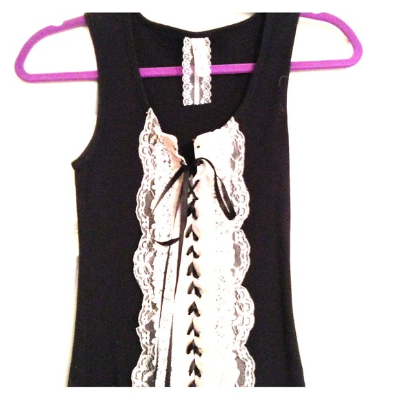 A lace up tank and vs pajama pants