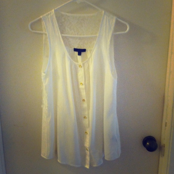 White top with gold buttons