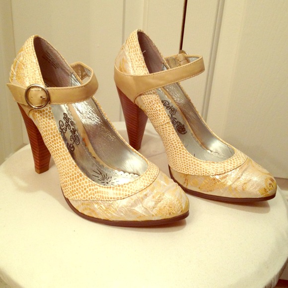 Gold lace design Naughty Monkey heels.