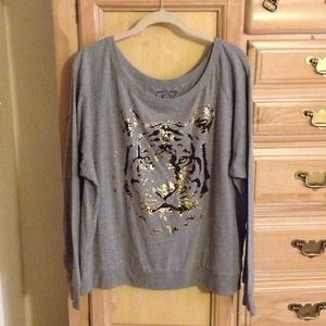 Sold*** locally***Long sleeve shirt w/tiger print