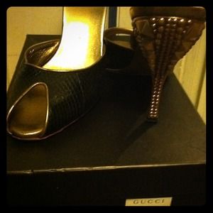 Black and gold official Gucci slip on