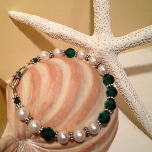Sterling,pearl and Swarovski bracelet & earrings .