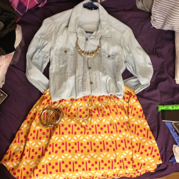 Patterned, silky mustard yellow skirt.