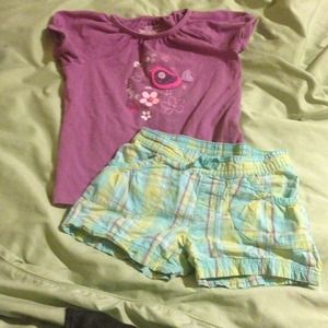 Purple bird top/stripe green n purple shorts