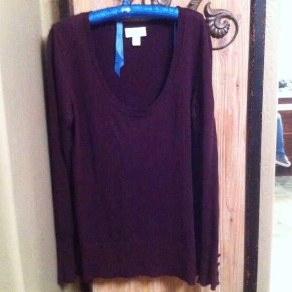 Sweater.  Scoop neck. Detailed cuffs