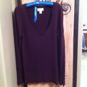 Sweater.  Scoop neck. Detailed cuffs