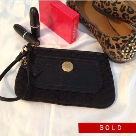 Black Authentic Coach wristlet with Leather pocket