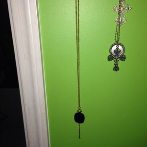 Black and gold tassel necklace.