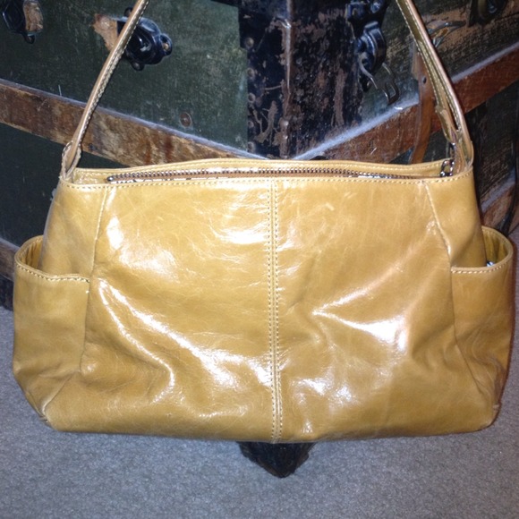 Tan Hobo International purse.