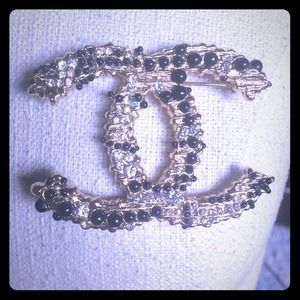 CHANEL logo brooch pin. Gold plated