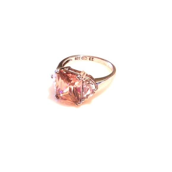 Authentic pink topaz & cubic zirconium ring.