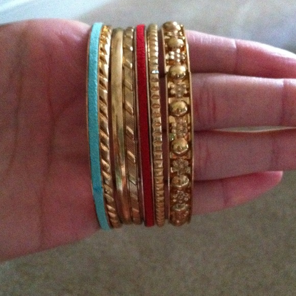 Gold bracelets.