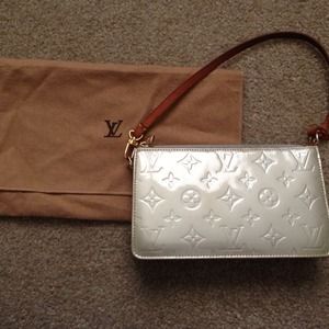 Authentic Louis Vuitton Vernis Lexington silver