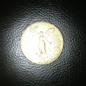 50 pesos coin  gold