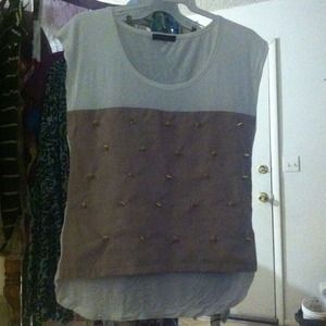 XTaren Top with gold colored studs.