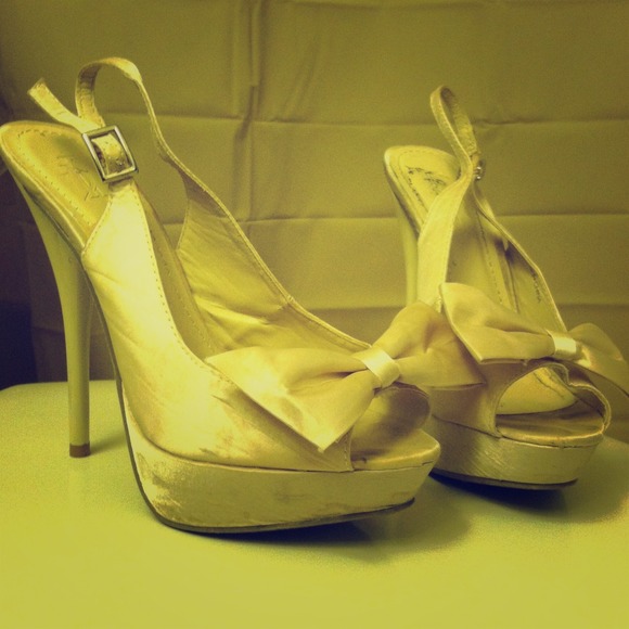 Beige sky high sling back bow heels