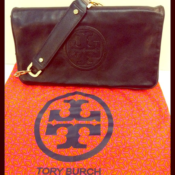**SOLD**BNWT Tory Burch leather clutch.