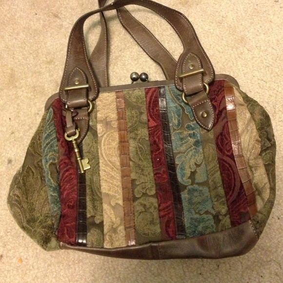 Trade w/ @brandye68!Fossil carpet bag!