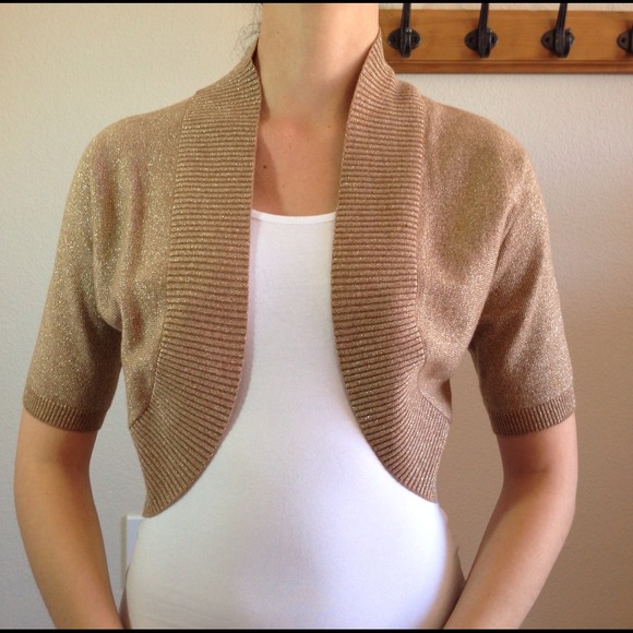Gold shrug