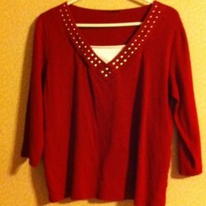 Red quarter sleeved top.