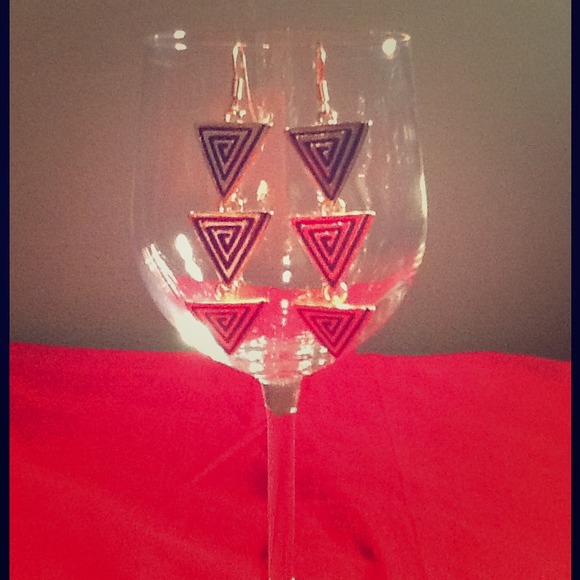 3 tear triangle earrings.