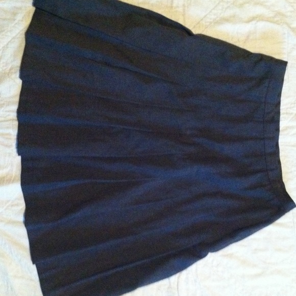 Grey pleated  knee length skirt. Size 10