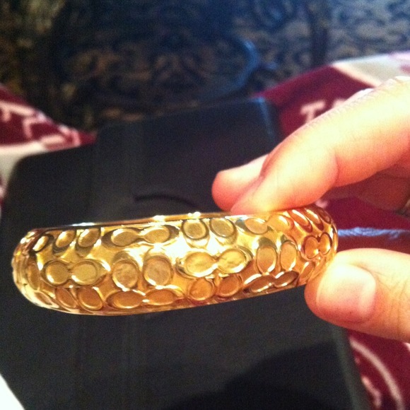 Gold coach bracelet