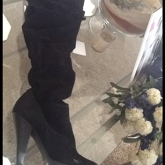 Thigh high black boots