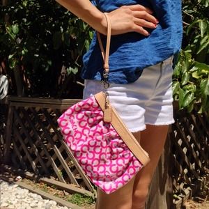 Authentic Coach wristlet.