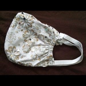 Justice white purse with gold and silver