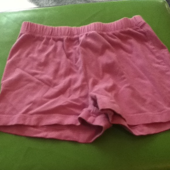 Pink short shorts.