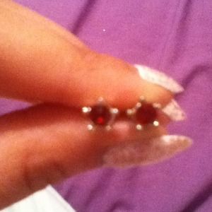 Red stud earrings, star shaped