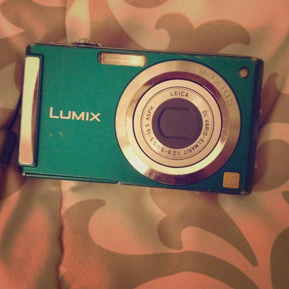 Teal lumix digital camera