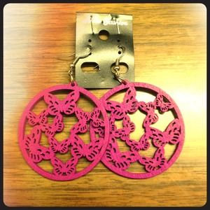 pink buttterfly ear-rings...by woof...only 3$