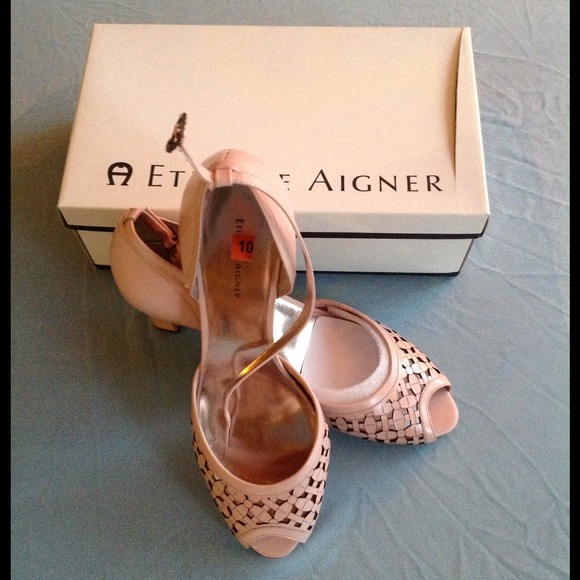 Blush pink, peep toe 3 in heels.