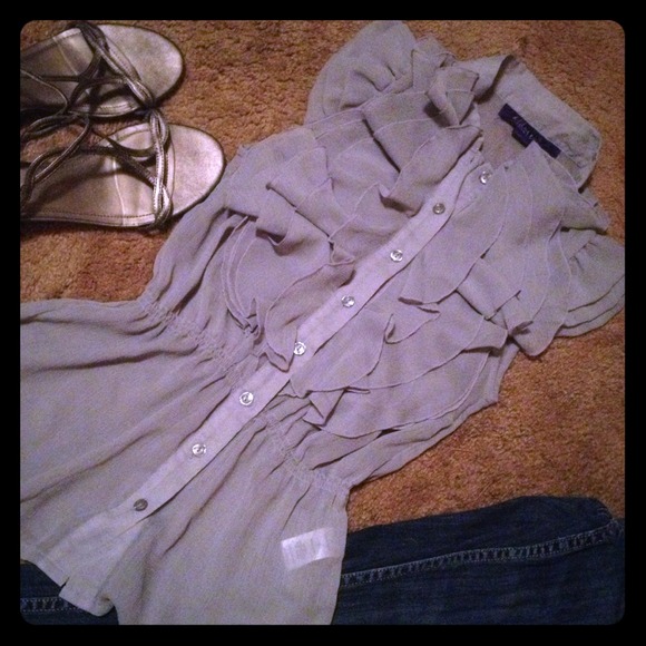 Gray ruffled chiffon shirt.