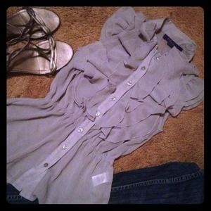 Gray ruffled chiffon shirt.