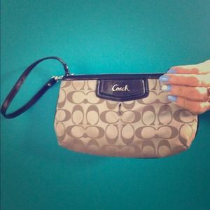 Brand new never used coach wristlet.
