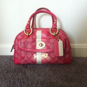 Pink and white coach logo bag