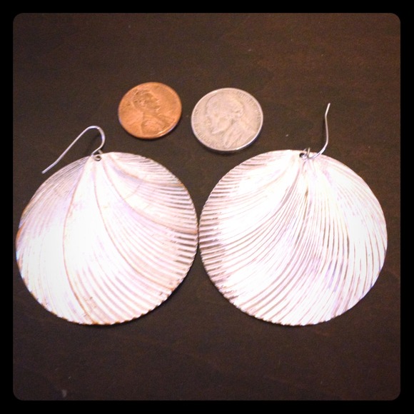 silver earrings.