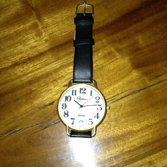 SOLD .. 4 SHEYBUTTER..Woman's large face watch