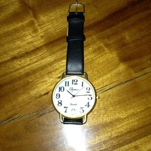 SOLD .. 4 SHEYBUTTER..Woman's large face watch