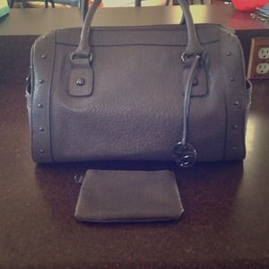 Grey doctor shaped bag. Style and company