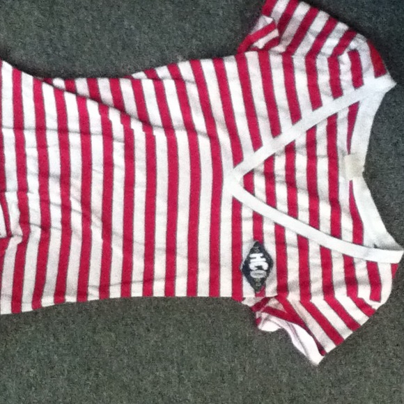 White and pink stripped T-shirt.