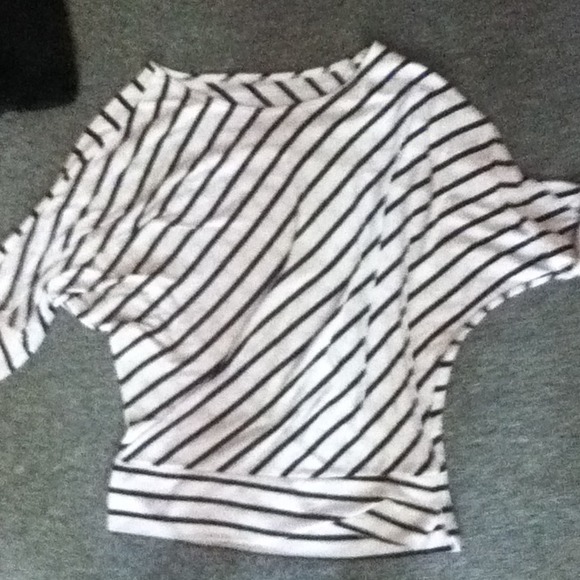 White and blue stripped shirt.