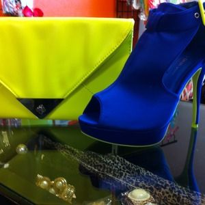 Neon clutch and blue heels