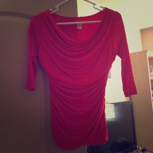 Red form fitting blouse