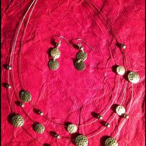 Gold-tone triple strand necklace and earring set