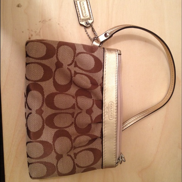 Authentic coach clutch
